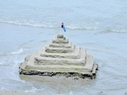 Aussie Flag Flies Proudly Over Sand Castle As Tide Rolls In-gallery